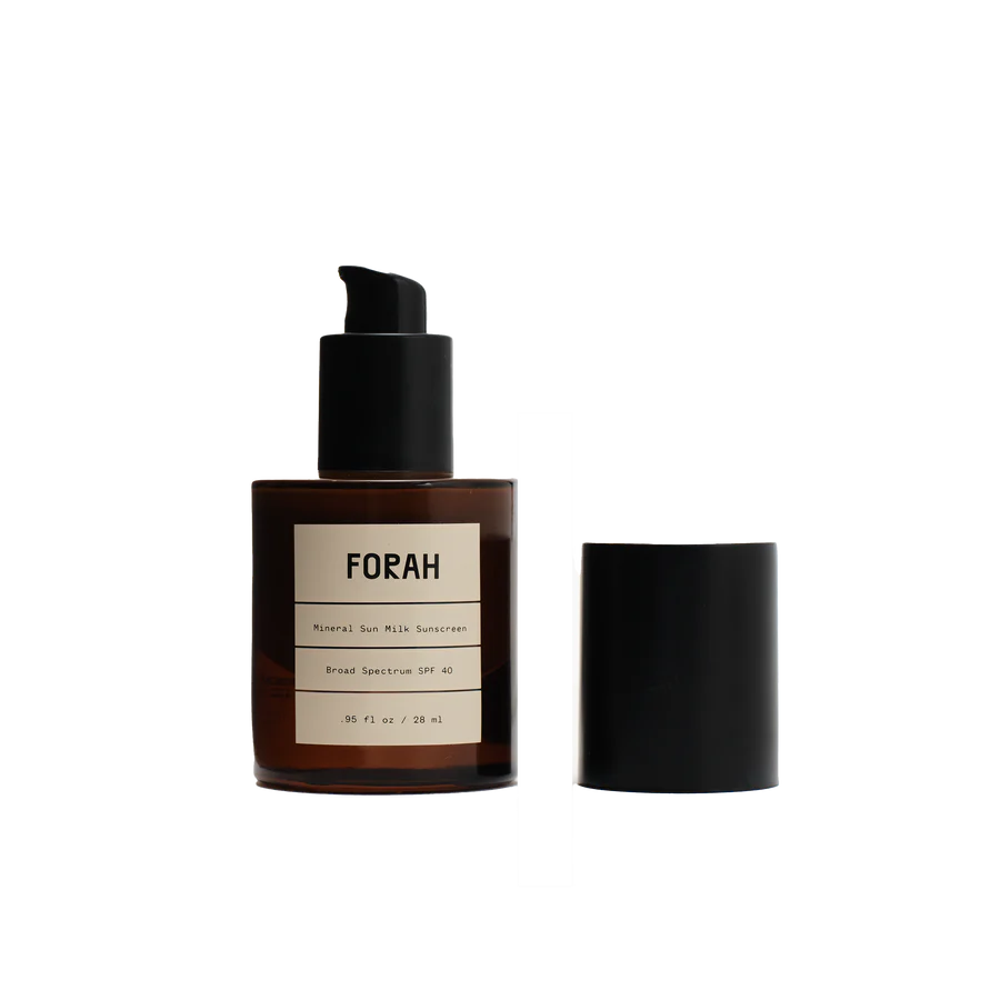FORAH sunscreen bottle with pump and cap on a white background