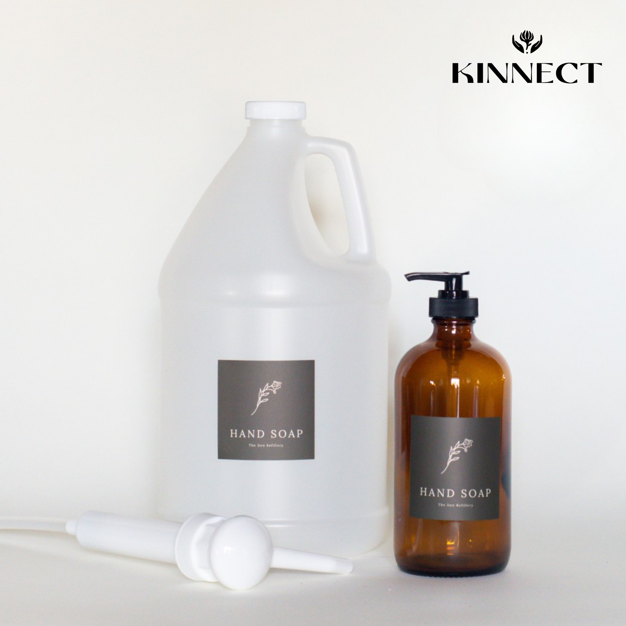 White and amber hand soap bottles with KINNECT branding on a white background