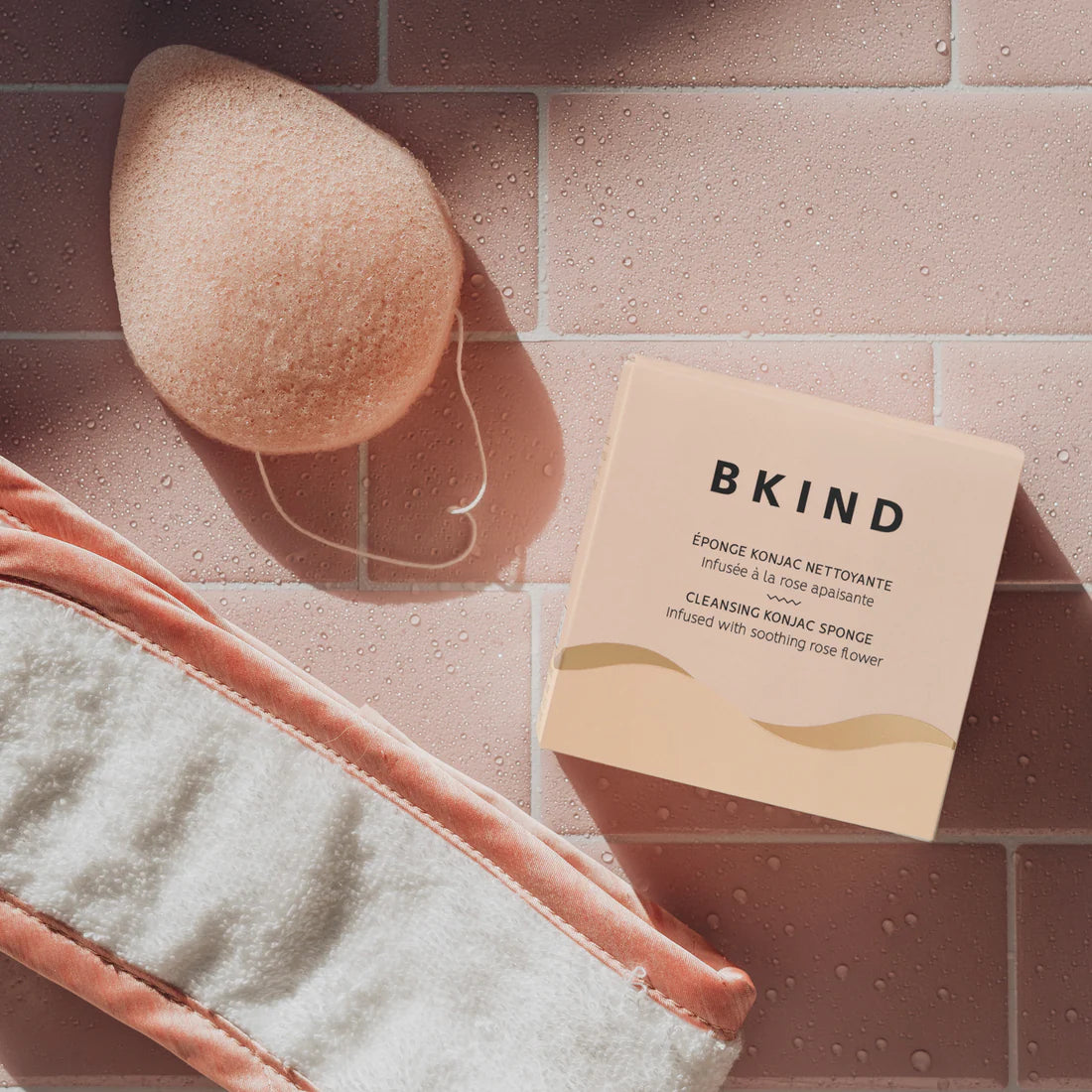 Konjac sponge and packaging on a tiled surface