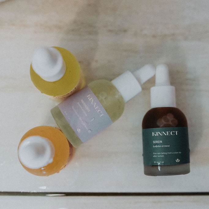 All four essential oil blends splayed on the table 