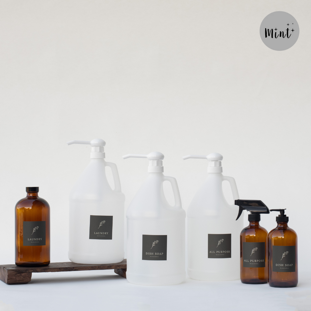 The Den Refillery Cleaning Refill Starter Kits with amber glass bottles