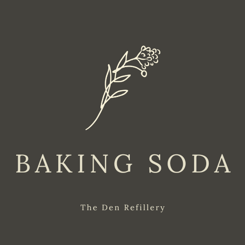 The Den Refillery Baking Soda Label. It is a black label with an illustration of a salal branch