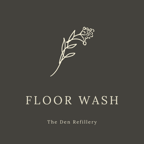 The den Refillery black floor wash label with an illustrated salal branch and white lettering