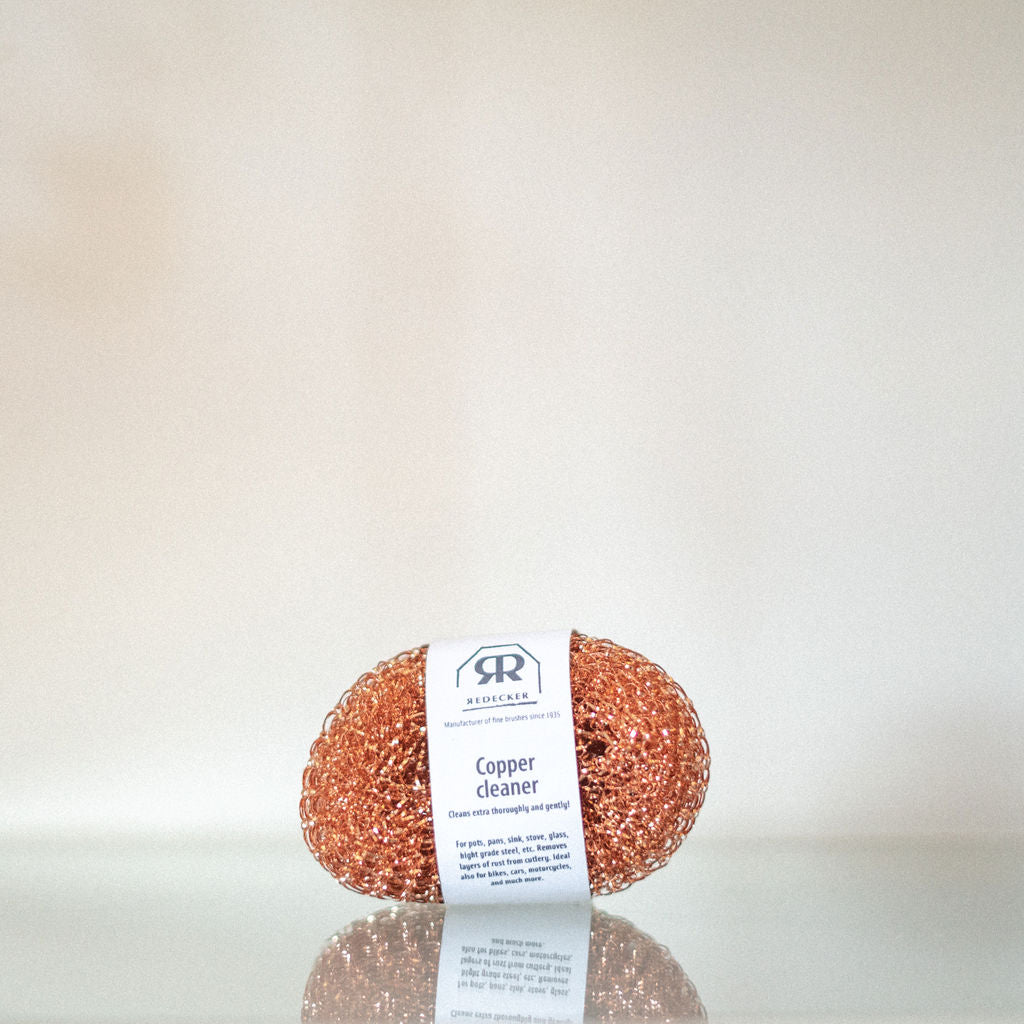 Two copper sponges in paper packaging 