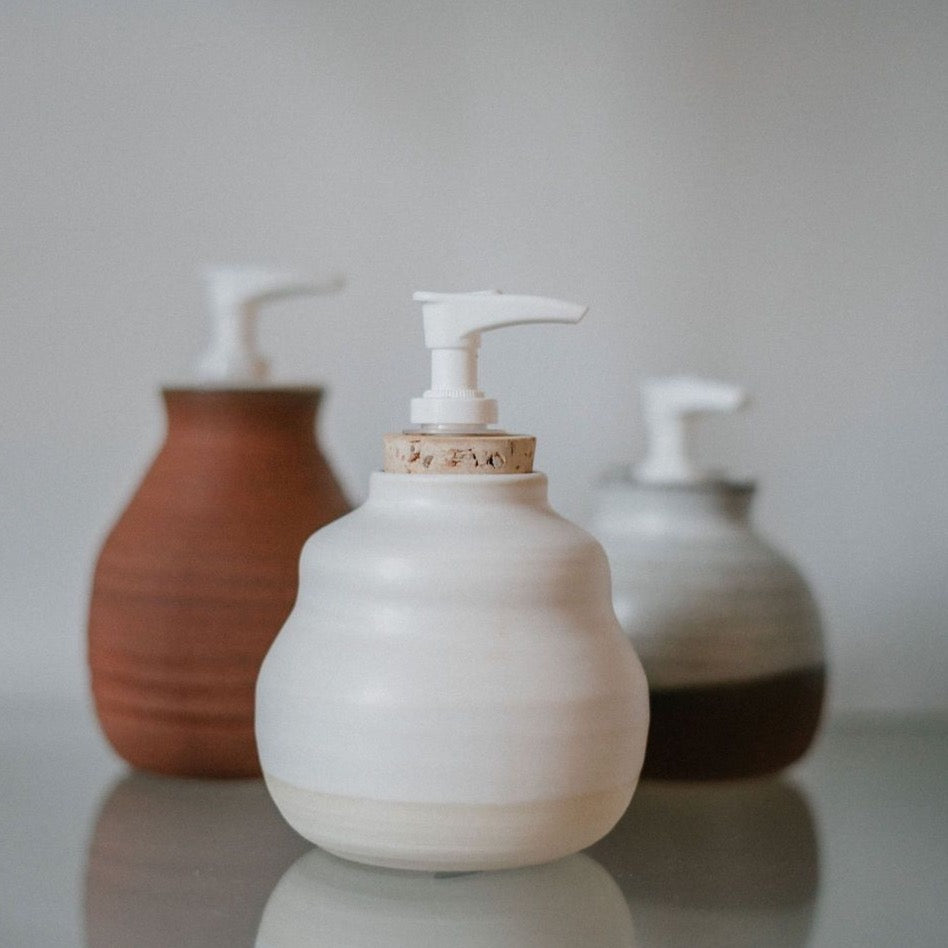 Three of Kay Ceramics ceramic soap dispensers