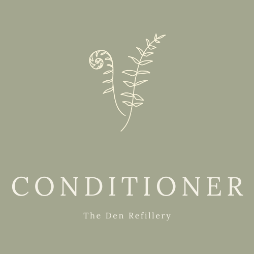 Green conditioner label with white text and illustrated ferns. Label also says ‘The Den Refillery’