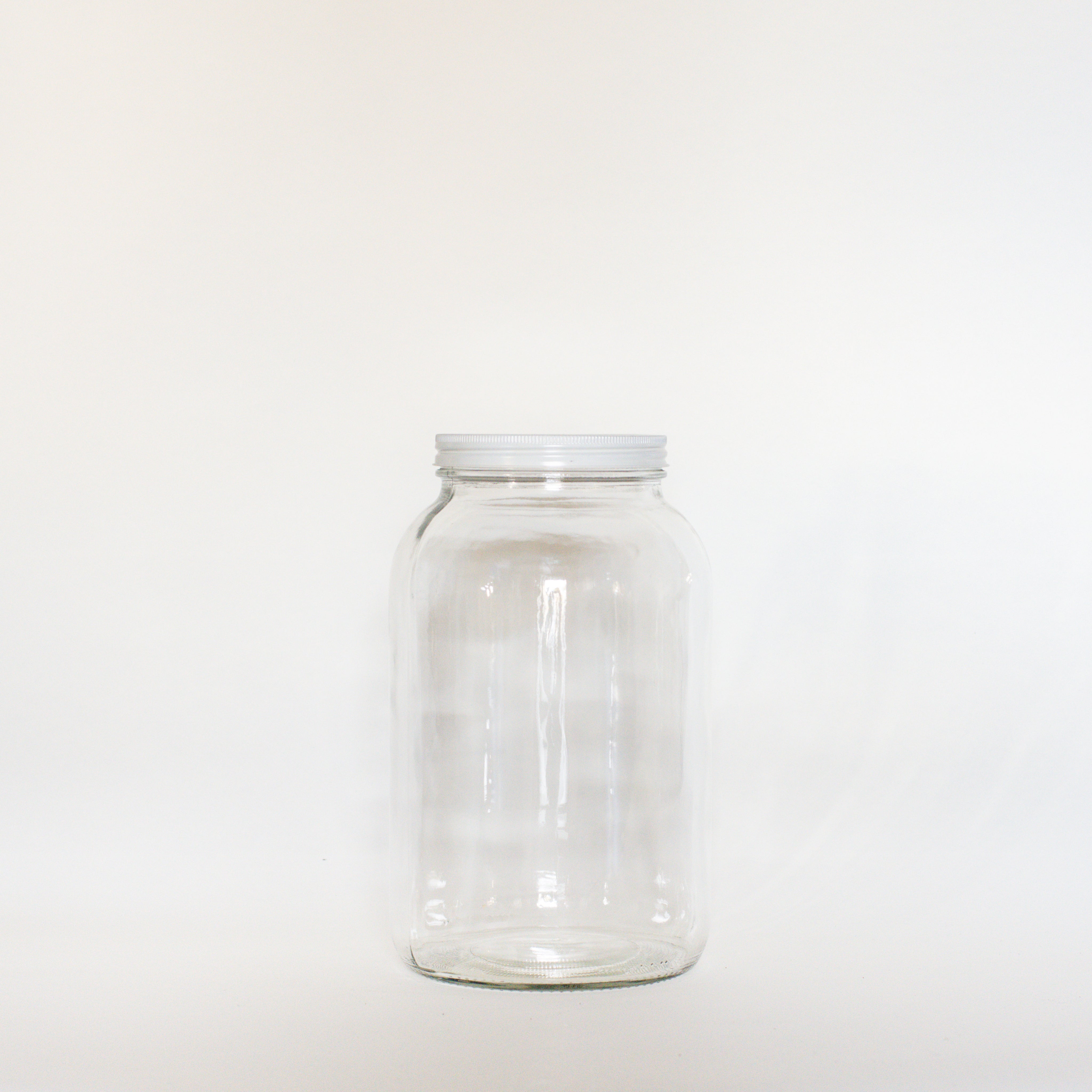 Clear and empty 4 Litre glass jar