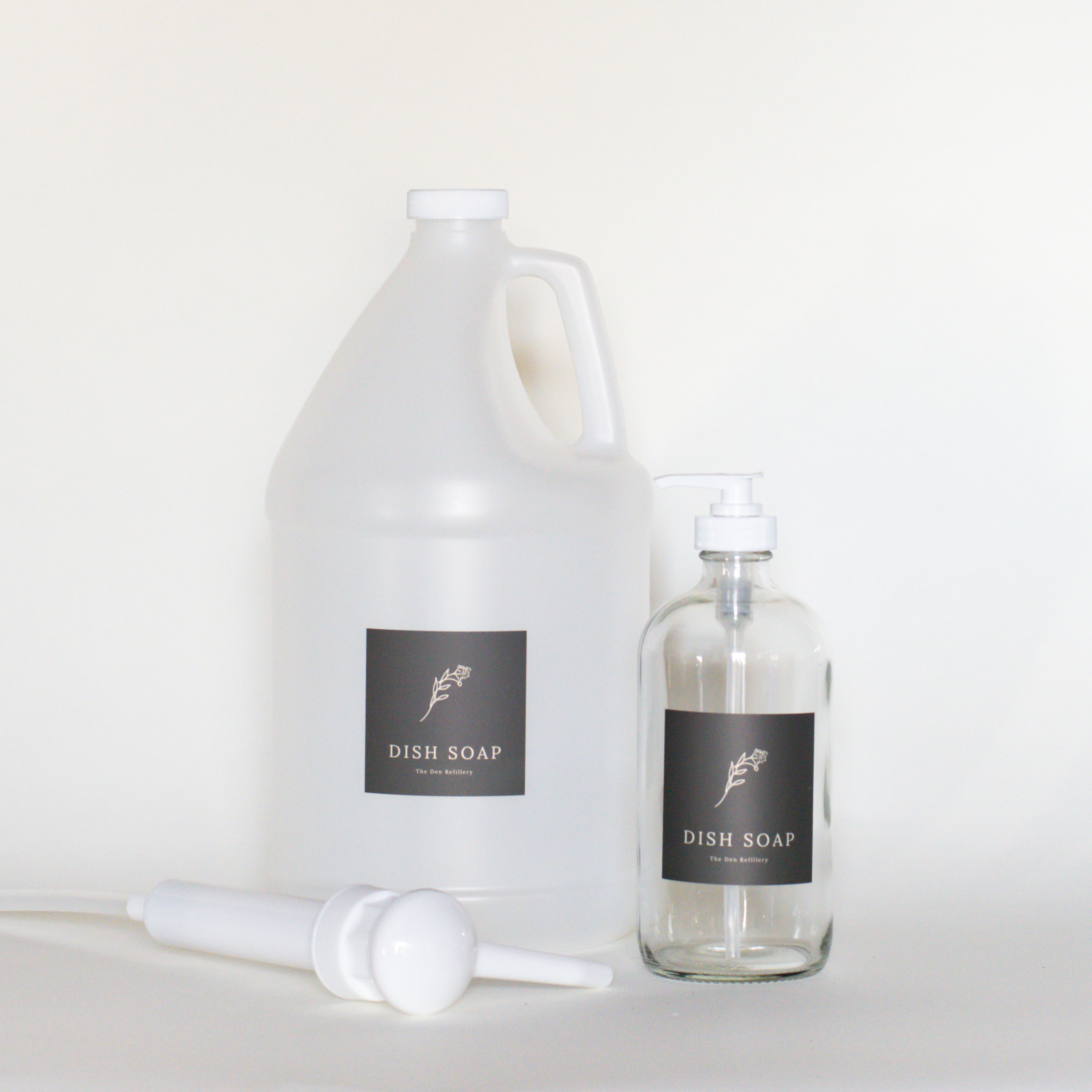The Den Refillery Dish Soap refill kit with a clear glass bottle