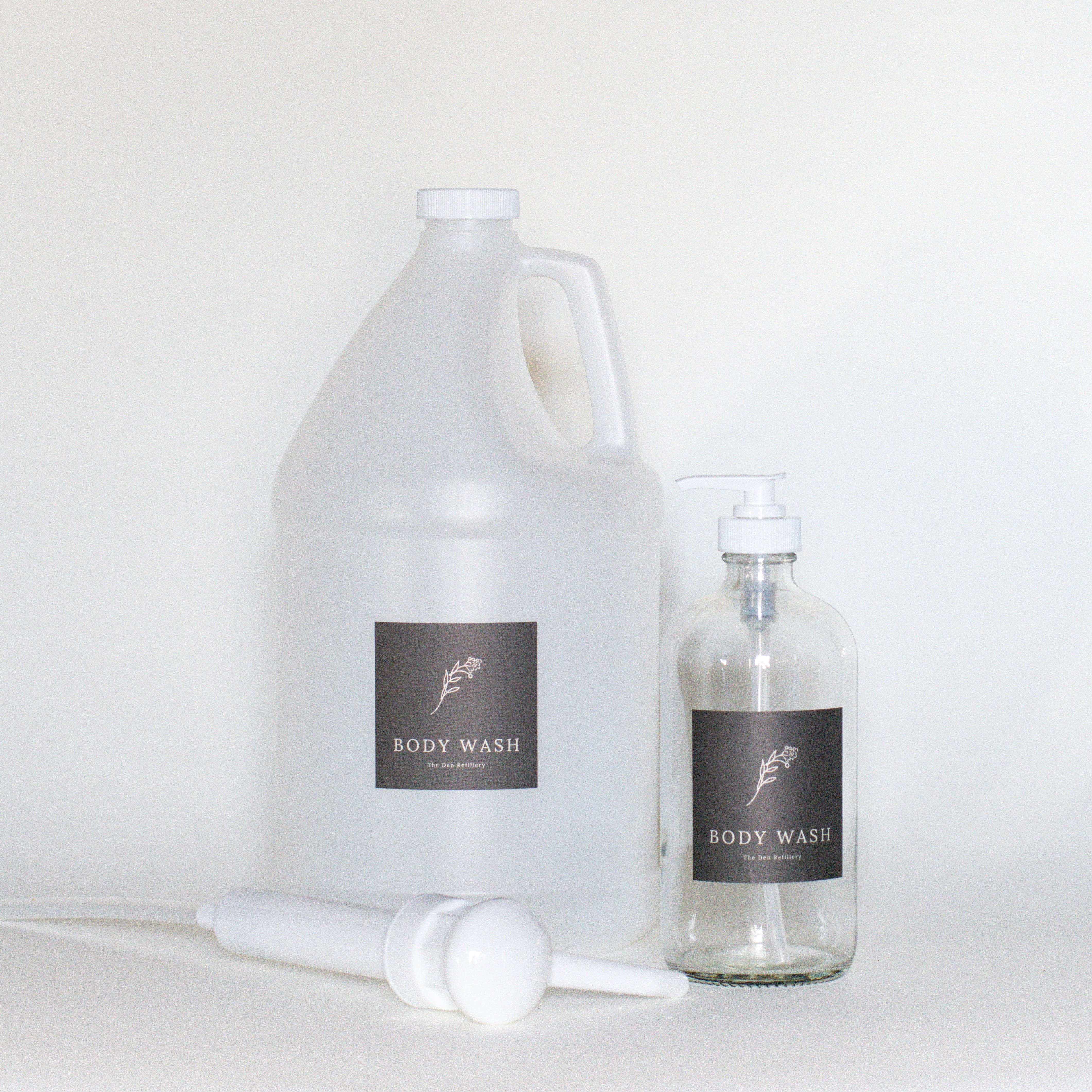 The Den Refillery Body Wash Kit with clear glass bottles
