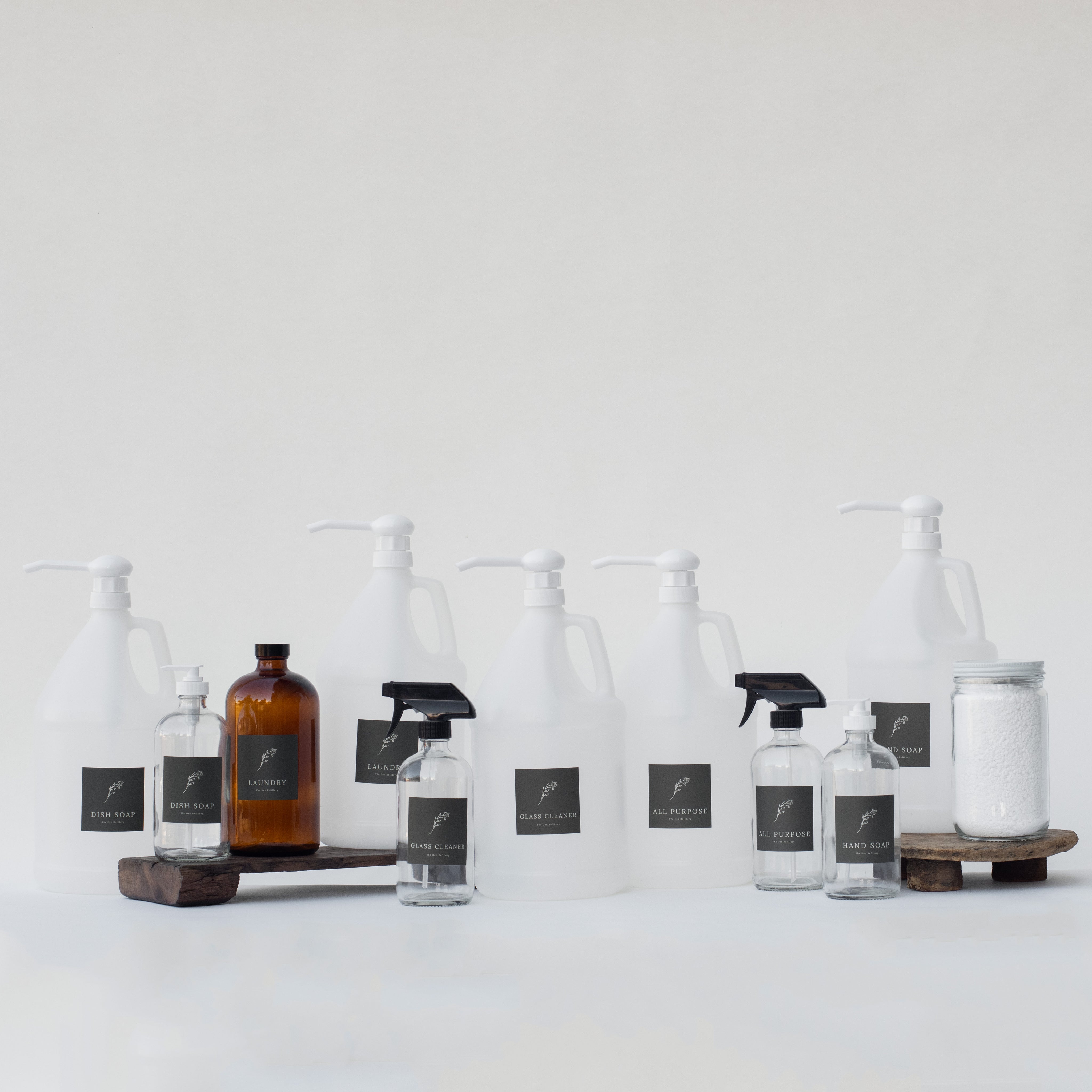 The Den Refillery Deep Cleaning Kit with clear glass bottles